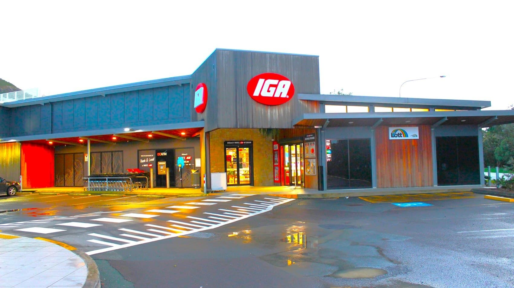 White's IGA Mt Coolum is set within a community shopping village with carparking directly adjoining the store. A pedestrian crossing connects to other shops in the village and provides a step free access from the car park into the store. There is one accessible car space positioned directly out the front of the store entrance. The store is readily identifiable from David Low Way.
