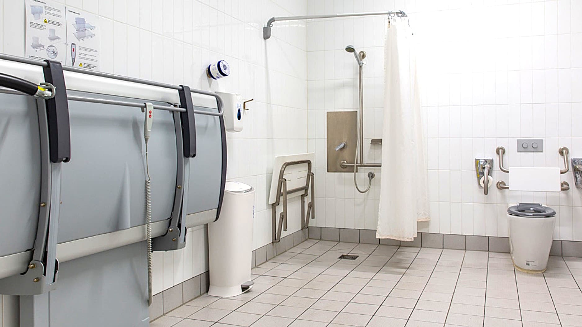 The Changing Place is equipped with a fully accessible toilet, adult change facility, shower with grab bars and bench, and sensor lighting. Guests can use the hoist but need to bring their own compatible sling. Shower area is covered by a non-see through white shower curtain for privacy.