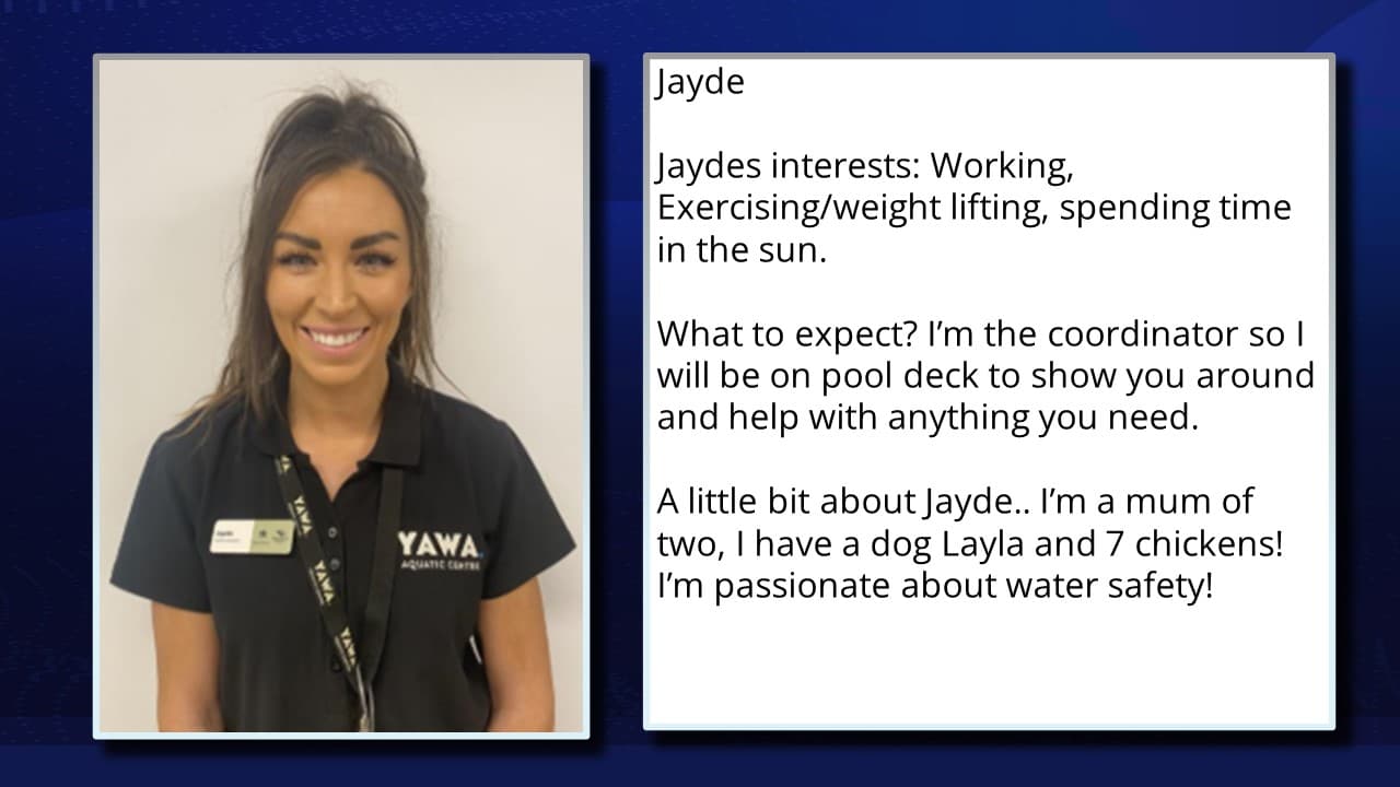 The image depicts a smiling woman in a dark polo shirt with the "YAWA Aquatic Centre" logo. Her name, "Jayde," is on a name tag. A text box to the right provides more details. It mentions her hobbies: exercise, weight lifting, and enjoying the sun. Jayde is identified as the coordinator, responsible for showing newcomers around and assisting with pool deck activities. Personal details include being a mother of two, owning a dog named Layla, having seven chickens, and a passion for water safety.